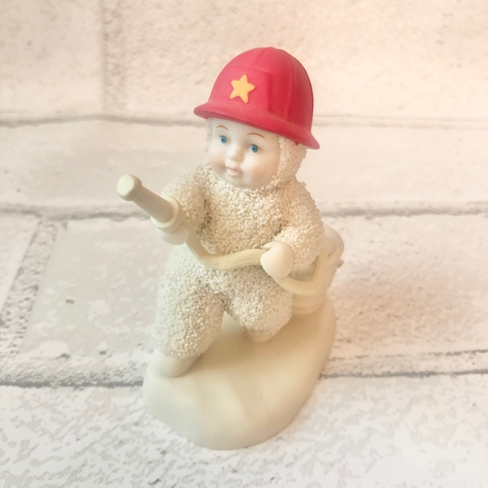 Department 56 Snowbabies "To The Rescue" Firefighter Figurine - Retired